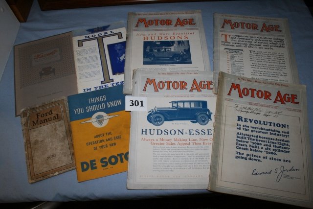 Box of auto books: Box of auto books: 4 Motor Age magazines, Feb. 25, Sept. 25, Aug. 26, Nov. 26; 1926 DeSoto, Model T, 1911 Maxwell, 1920 Ford.