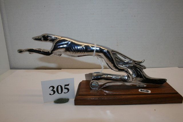 1935 Ford Greyhound hood ornament: Mounted 1935 Ford Greyhound hood ornament, some pitting. 9”