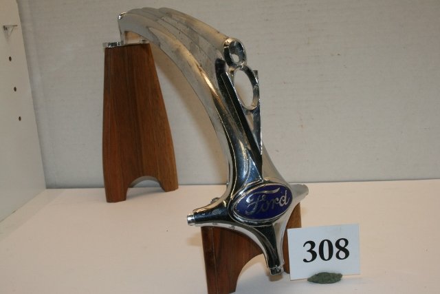 1936 Ford V-8 hood ornament: Mounted 1936 Ford V-8 hood ornament, pitted. 16”