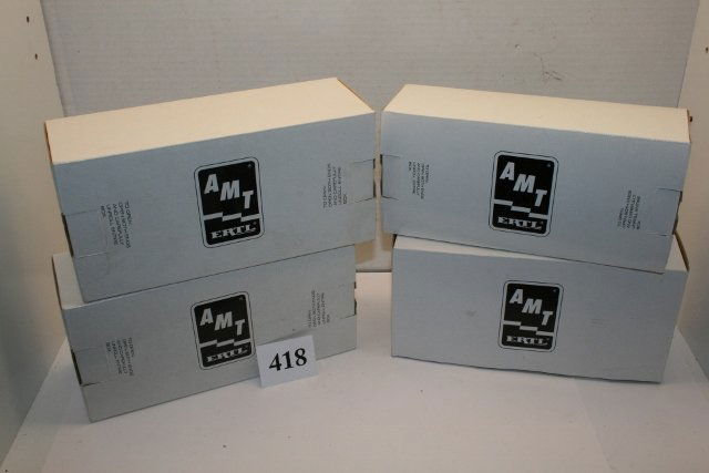 Four AMT/Ertl plastic car models: Four AMT/Ertl plastic car models: 2- 93 Ford Rangers, 95 Mustang, 95 Ford Explorer.