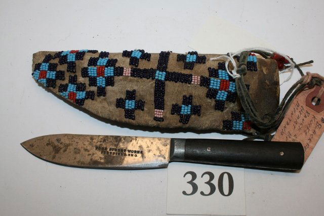 7” Blackfoot Knife Sheath: 7” Blackfoot Knife Sheath – circa 1880-1890, Bead Decorated, leather stiff with 7 3/8" old sheffield england trade knife marked Pond Street Works