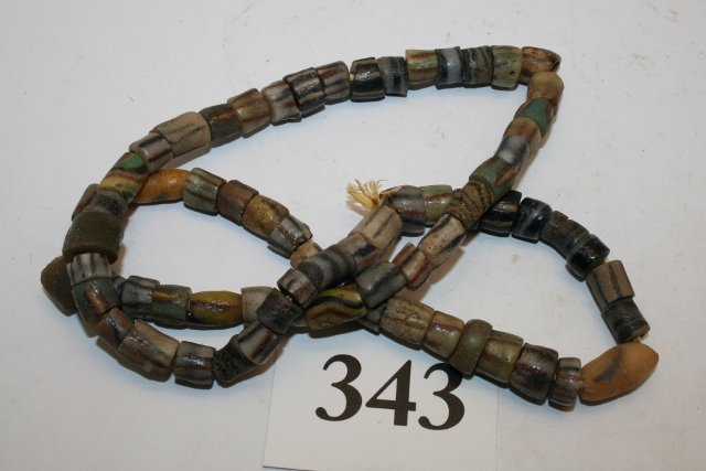 Strand Early Sand Cast Beads: 24” Strand Early Sand Cast Beads