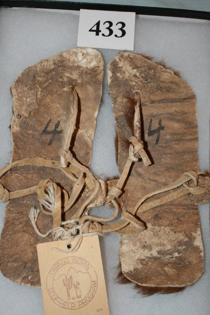 2 Papago Indian Sandals Buffalo Hide: 8 x 12 Frame with 2 Papago Indian Sandals Buffalo Hide, Sells, Arizona, by Papago Indian Self Help Program