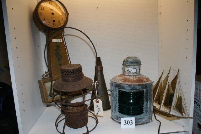 Brass Green Ships Marker Lantern: Brass Green Ships Marker Lantern, Rusty Hanlan Farm Lantern, Navagator’s Case Draughtman Tools, Brass Decorative Sailboat, Sailboat on quartz base, brass Lux Funnel, Lead Buckle, Lucite Draught Man�