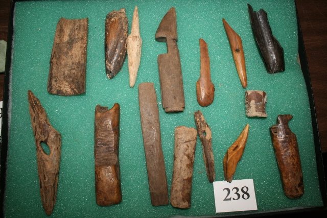 15 Wood, Ivory, Bone Eskimo – Inuit Artifacts: 12 x 16 Frame with 15 Assorted Wood, Ivory, Bone Eskimo – Inuit Artifacts will not ship out of country