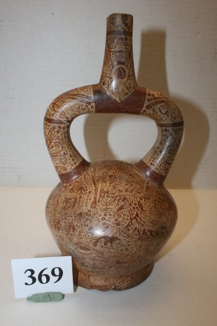 Peruvian Saddle Water Jar: 5 ¼” x 9 ¼” Peruvian Saddle Water Jar – fine line design used as a burial pot – broken & glued