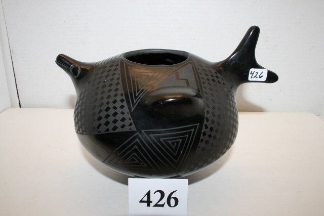 Effigy Fish Black on Black Pottery Vessel: 9” x 6 ½” Effigy Fish Black on Black Pottery Vessel signed Jose Quezada