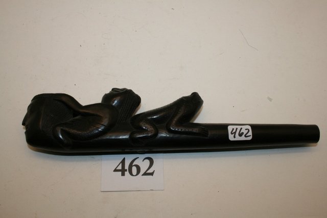 Argillite Elongated Pipe: 9 ¾” Fantastic Carved Argillite Elongated Pipe, Human Effigy Bowl, seated male figure with leaping frog effigy at back – highly polished, North West Coast