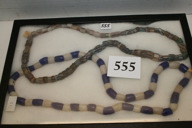 Sand Cast Trade Beads: (2) 25” Strands of Rombold Sand Cast Trade Beads, multi colored