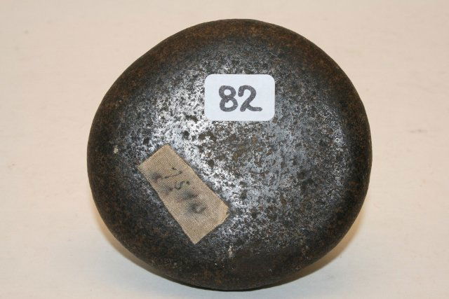 Stone Disc Concave: 3” Stone Disc Concave on one side – old tag reads “Hand Metate”