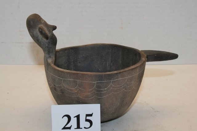 Human Head Effigy Caddo Bowl: 5 ½” x 5” Human Head Effigy Caddo Bowl – scalloped design incised at top of bowl, handle which appears to have been made of stone has been applied to front, otherwise solid – age uncertain