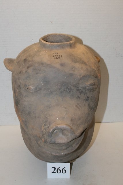 Effigy Pig Water Jar Caddo: 11” x 11” Effigy Pig Water Jar Caddo, Arkansas – appears solid marked #30 Caddo, Ark. Possible some restoration at top, plaster added to base by museum staff