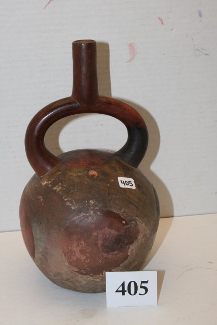 Peruvian Water Bottle: 9 7/8” x 5 3/8” Pottery Ring Spouted Handled Peruvian Water Bottle, Solid but has been restored on sides
