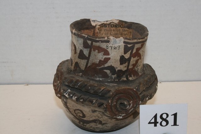 Polychrome Zuni Jar: 5” x 4” Fine Painted Polychrome Zuni Jar – old tag states “Pre Historic” From the Ruins of the Ancient City of Cibola in New Mexico and visited by Coronado 1540 Highly boss relief around sid
