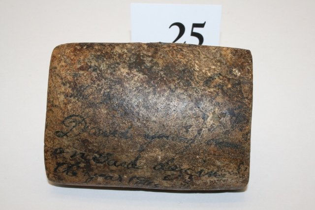 Hardstone Shuttle Bannerstone: 3 3/8” x 2 ½” Partially Drilled Hardstone Shuttle Bannerstone, found by Isrial Young in 1845, original scroll writing on artifact – Ex. Ken Black Coll.