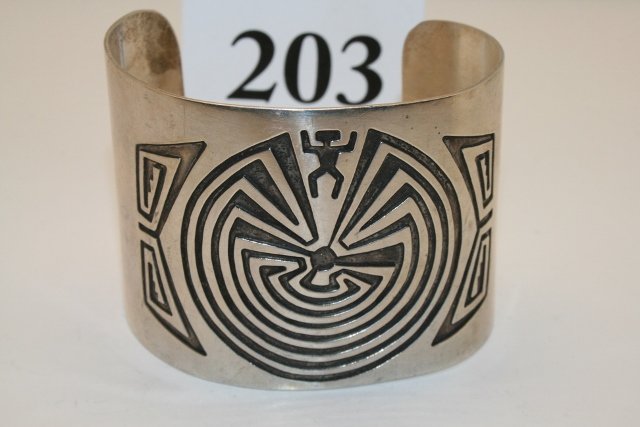 Man in Maze Engraved Bracelet: 2 ½” Man in Maze Engraved Bracelet marked Sterling SG
