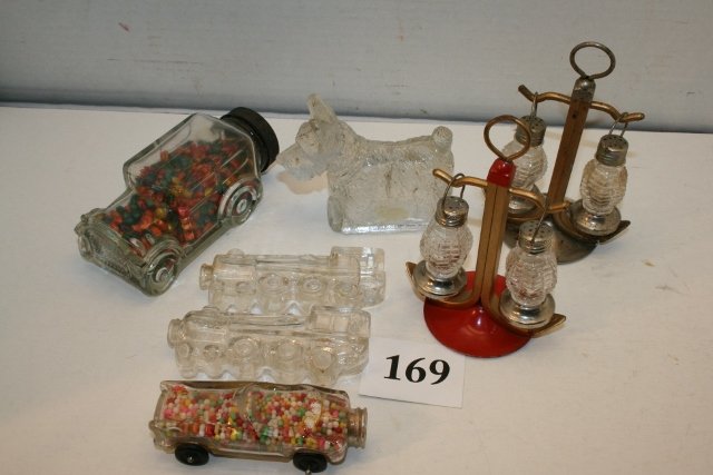 Car with plastic cap: Car with plastic cap, 2 small trains, no closures, small car with candy with tape holding tins in place, scotty dog, 2 lanterns, with salt & pepper shakers