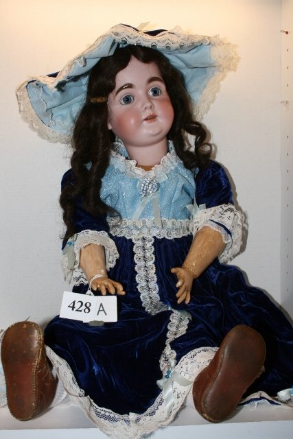 Large Bisque Doll: Large Bisque Doll with clothes (made in Germany) M ½ #164 16 ½” – Compo Body, blue eyes, open mouth, arms rough, mold seams on each side of head, one eye chipped