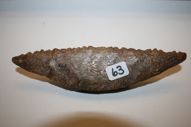 Serrated Crescent Danish Knife: 6 ½” Serrated Crescent Danish Knife, made of Fossilized embedded Flint from the Tim Ponstingle Coll.