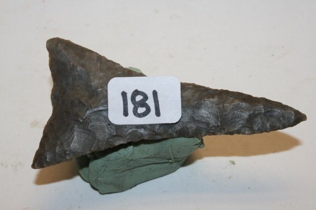 Triangular Spear Point: 2 ¾” Fine Triangular Spear Point, appears to be gray Coshocton Flint, Lucas Co. Ohio