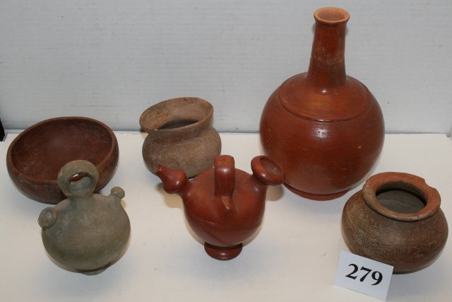 6 Pottery Items: 6 Pottery Items: Red Glazed 5 ½” x 8 ¼” Long Neck Water Bottle marked Cuba and 3 Pottery Bowls, 1 damaged bowl and a double spout pitcher, age uncertain