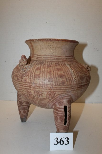 Tripod Polychrome Mayan Rattle Bowl: 7 ½” x 9 ¼” Tripod Polychrome Mayan Rattle Bowl, has balls in legs, tan base with rusty red markings, effigy heads around bowl, some damaged & missing – great pc!