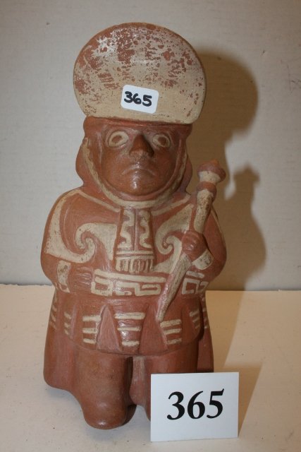 Moche Male Figure Water Bottle: 4 ¼” x 8 ¾” Red on White Stirrup Handle, Moche Male Figure Water Bottle from the Oppenheim – Cranfill Coll.
