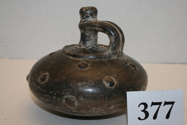 Blackware Ovid Vessel: 4 3/8” x 5” Blackware Ovid Vessel with studded surface, spout with arched handle, Ecuador from the Oppenheim – Cranfill Coll.