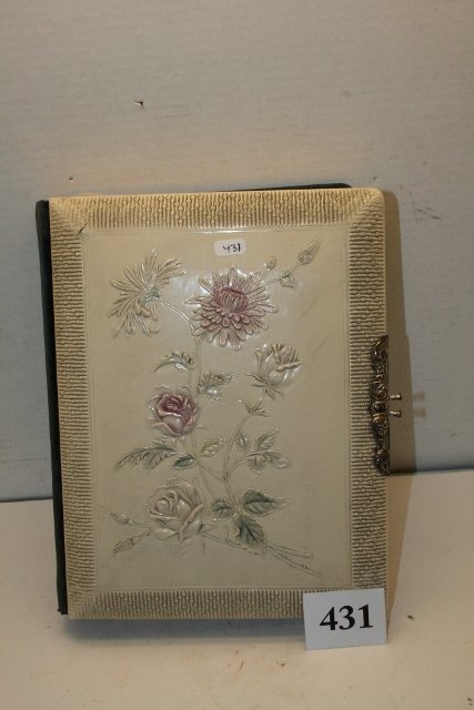 Celluloid Photo Album: 8 ½” x 11” Celluloid Photo Album – full of late 1800’s pictures – flower design front