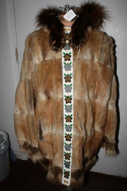 Fur Pull Over Parka: Medium Size Silk or satin Lined Pieced Fur Pull Over Parka – Alaska, Fantastic Looking, extremely warm coat with animal claws and beaded trim – does not come with handsome eskimo model wearing the