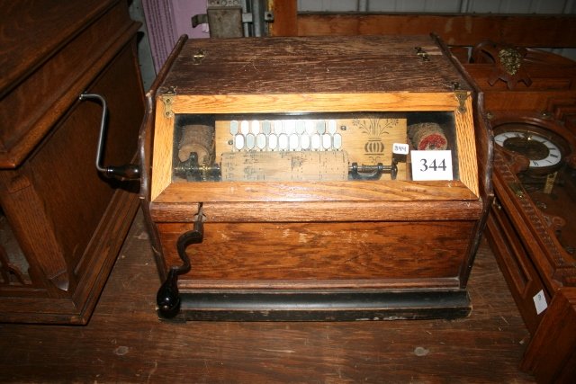 Cob Organ or “Concert Roller” Organ: 14” x 17” x 12 ½” oak case Cob Organ or “Concert Roller” Organ – door has been repaired – it works