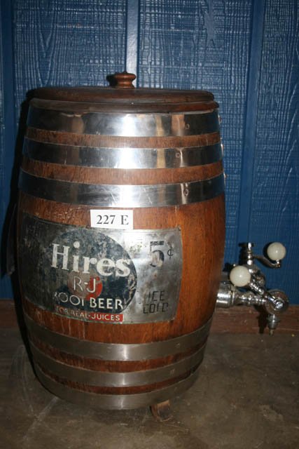 Root Beer Dispenser: 25 1/2" tall Hires Root Beer Dispenser, Oak Lid with insides - Hires sign rough-worn with 2 spigots - metal bands on top and bottom - will not ship