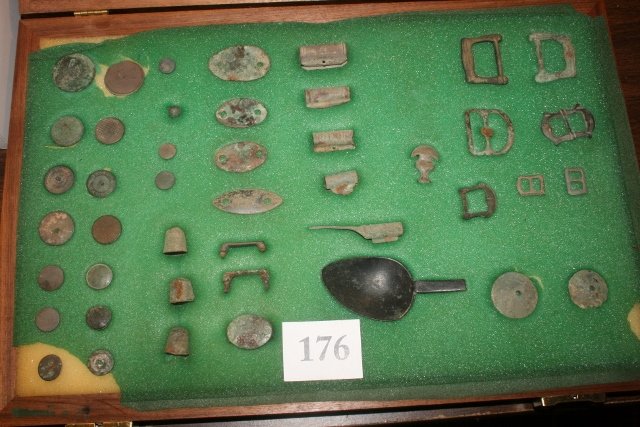Cherokee and Creek Indian Trade Items: 12 x 18 Wood Frame with large assortment of Cherokee and Creek Indian Trade Items, from Village Sites – Ex. Dan Stroud Coll. Buckles, spoon, buttons, thimbles etc…. Nice selection