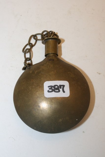 2 5/8” Brass Tobacco Canister: 2 5/8” Brass Tobacco Canister with chain stopper, engraved corn stalk on one side, circa 1870’s