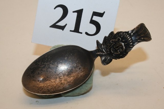 Silver Invalid Spoon: 3 ¼” Silver Invalid Spoon with Indian Head Motif on handle – nice old spoon