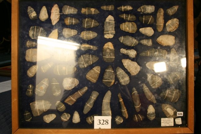 67 Flint Scrapers, Knives: 21 ¾” x 17” Wood Frame Display containing a total of 67 Flint Scrapers, Knives – Ex. Danny Cross Coll. – largest 3 ¾”