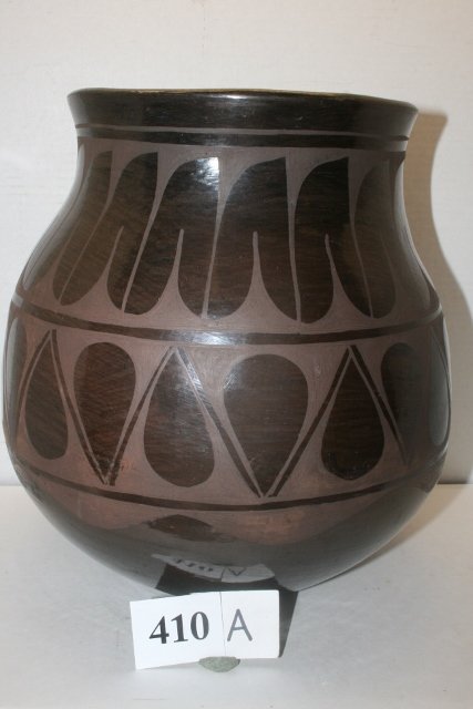 Santo Domingo Black on Black Large Storage Jar: 12 x 12 ¼” Santo Domingo Black on Black Large Storage Jar – made by Raphael Aguilar