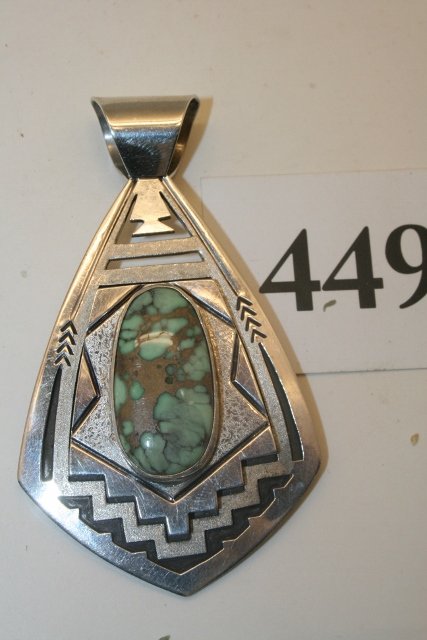 Heavy Silver Kerchief Slide Pendant: 3 ½” x 2” Heavy Silver Kerchief Slide Pendant with turquoise signed Peter Nelson (Sterling)