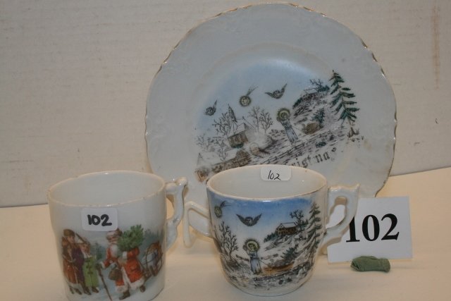 Merry Christmas Cup & Saucer: Merry Christmas Cup & Saucer with church & angel scene & cup with Santa Pulling Sled by Children