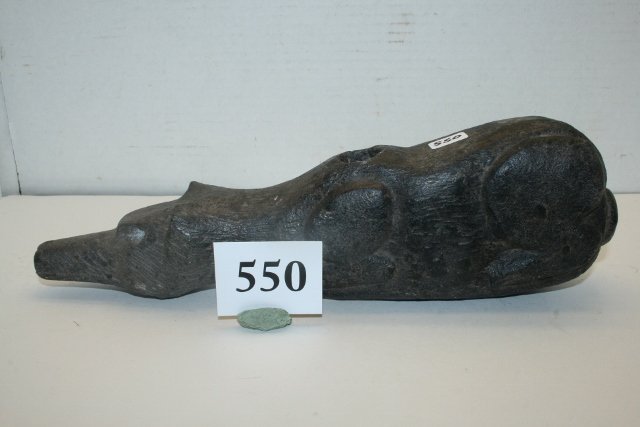 Steatite Bear Effigy Pipe: 11 ¾” x 3 ½” Steatite Bear Effigy Pipe, old tag reads “found at Great Falls, Montana by H.T. Daniels, very rare pipe! Age uncertain