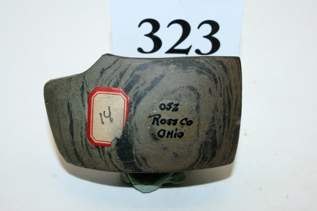 Banded Slate Geneculate Bannerstone: 2 3/8” x 1 5/16” Banded Slate Geneculate Bannerstone, prong broke off, smoothed by Indian, Ross Co. Ohio