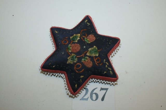 Moose hair on silk star shaped cushion (1 of 1)