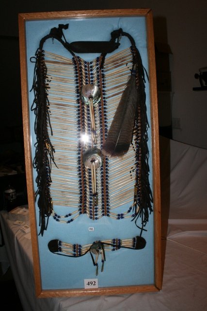 Hair Pipe: Large Hair Pipe and Brass Beaded Fringed Brass Plate with shell and Brass Drops and Pendants – Contemporary very showy in wood display case – finely made includes Hair pipe necklace