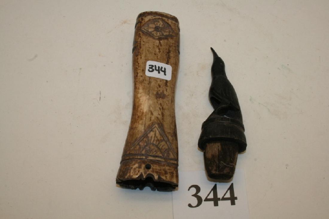 Water Buffalo Bone & Horn Needle Case: 8 ½” x 1 5/8” Water Buffalo Bone and Horn Needle Case, with etched designs and a Black Horned Raven/Crow Plug – well done - carved by Sasak people of Lombok, Indonesia -used as herb box.