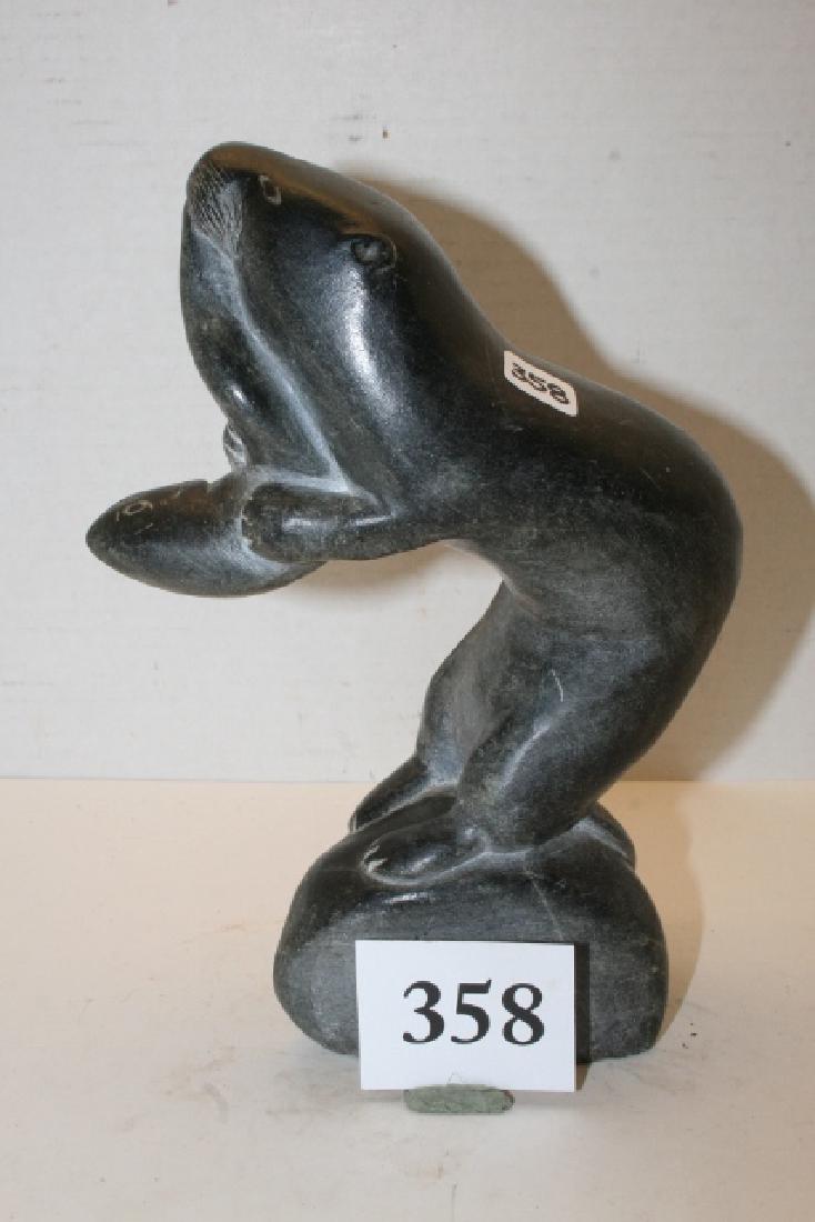 Soapstone Figure of Otter Eating Fish: 8 ½” x 3” x 6” Carved Artist Signed Soapstone Figure of Otter Eating Fish signed E-9 1360, contemporary/modernistic