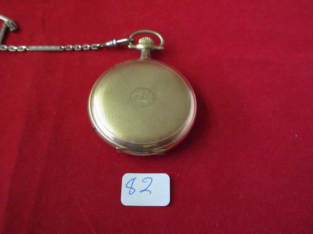 Gold filled hinting case Elgin pocket watch.: Gold filled hinting case Elgin pocket watch. Porcdelain dial in good condition. Running part time. Silver watch cahin. Monogram on back. BH Leese Xmas 1918. 17 jewel ser. 2007347 case measures 1 7/8 i