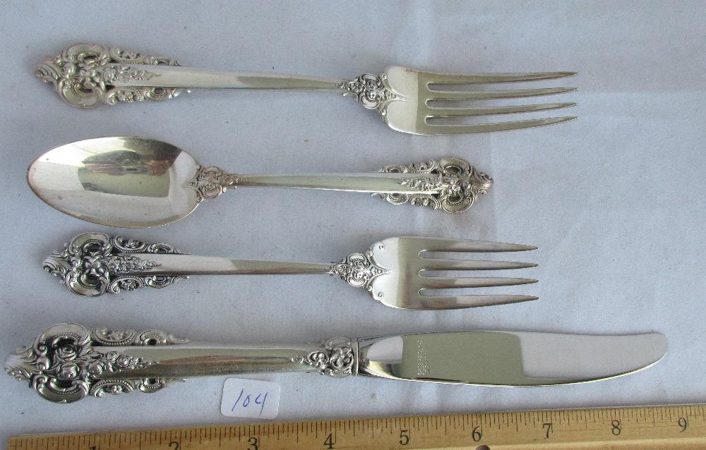 Wallace Grande Baroque sterling silver 4 piece place: Wallace Grande Baroque sterling silver 4 piece place setting,knife is 9 inches , fork is 7 1/4 salad fork is 6 1/2 spoon is 6 inches. 152 grams with out knife