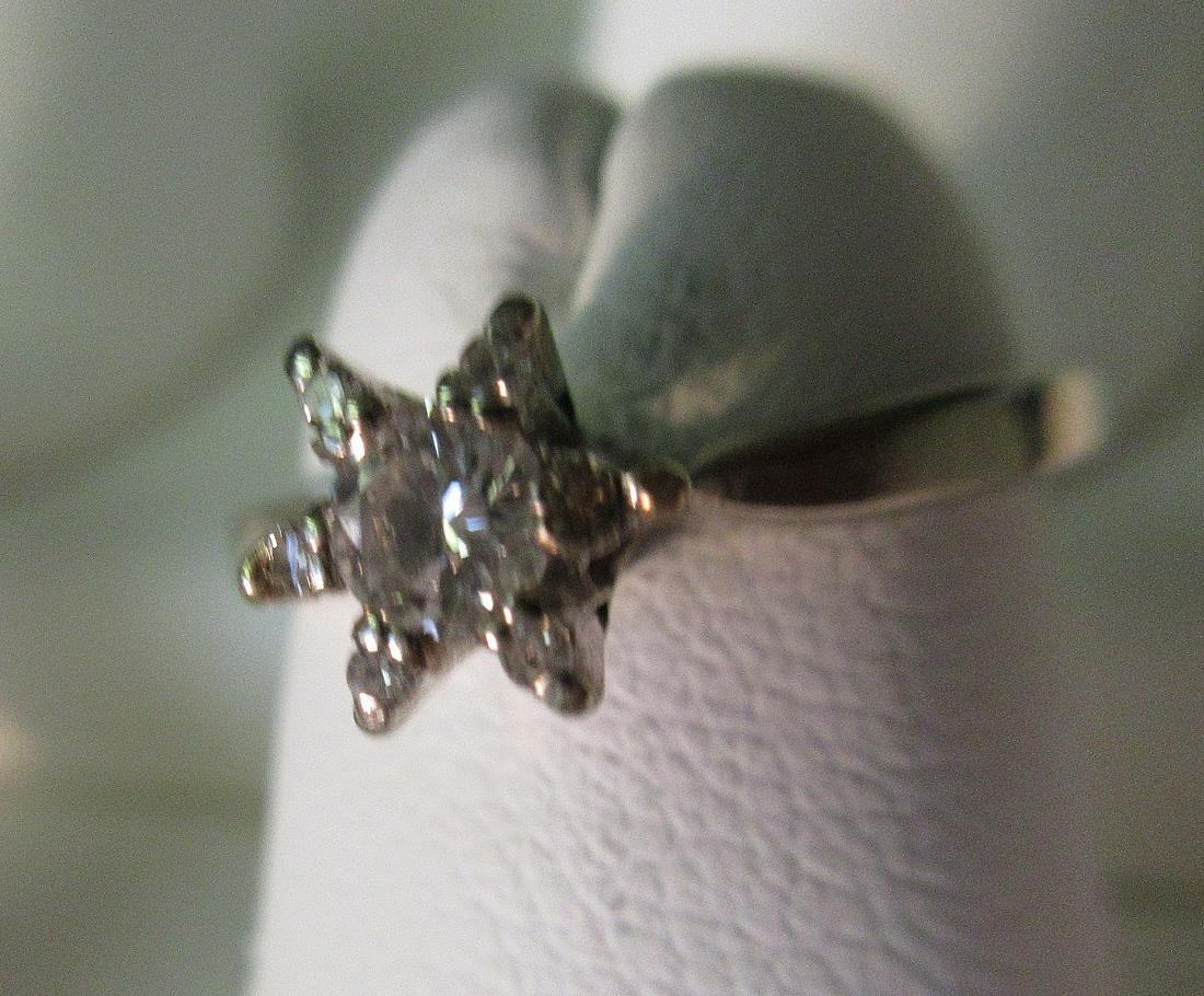 .2 ct diamond ring in 18 k gold size 3 1/4: .2 ct diamond ring in 18 k gold size 3 1/4 In good original as found condition. With great colors and detail