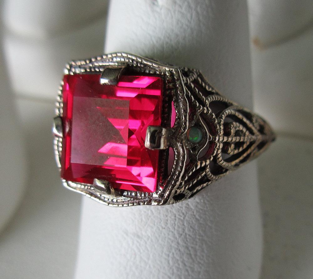 Approximately 3 ct lab created ruby sterling ring. 925: Approximately 3 ct lab created ruby sterling ring. 925 size 7 In good original as found condition. With great colors and detail