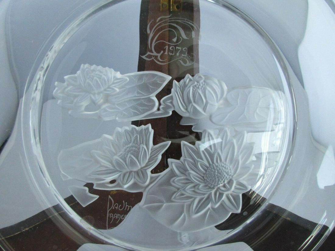 BEAUTIFUL VINTAGE SIGNED DAUM FRANCE ART GLASS PLATE: BEAUTIFUL VINTAGE SIGNED DAUM FRANCE ART GLASS PLATE. NYMPHEA WATER LILY PAD. DATED 1979. DESIGN IS CUT INTO BACK OF PLATE. No chips or cracks or damage. 8 1/2 “WIDE. Great quality and detail.